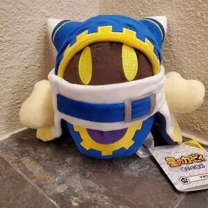 Adorable Blue and Yellow Stuffed Toy